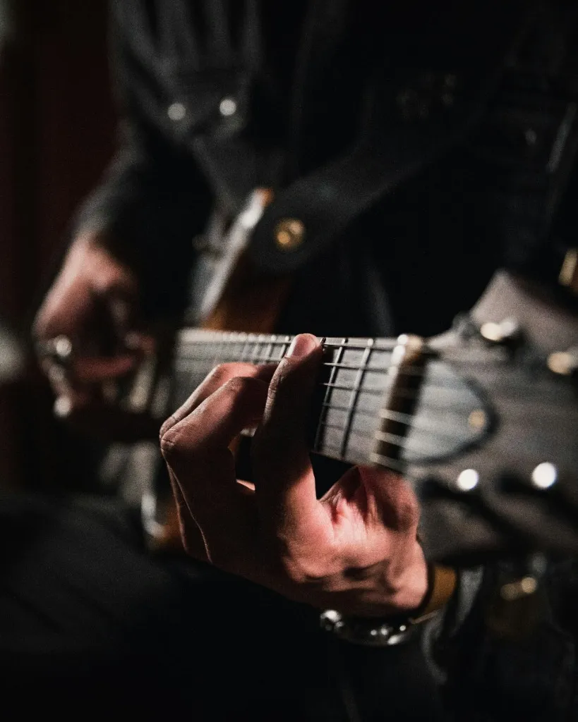 Guitarist performing live on stage